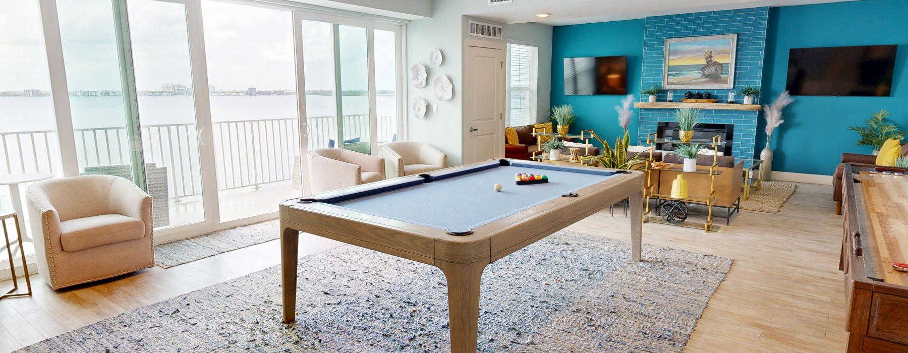 a room with chairs and billard table