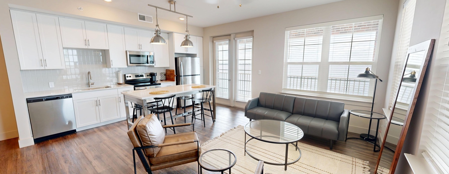 a living room with a wood floor