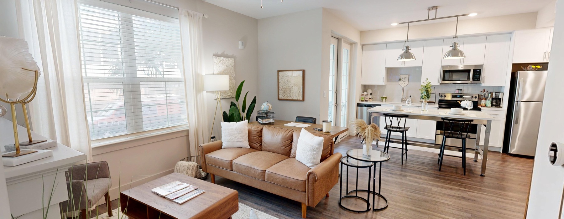a living room with a wood floor