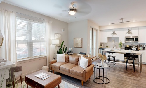 open living area couch chairs and table