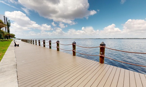 boardwalk with chairs and benches
