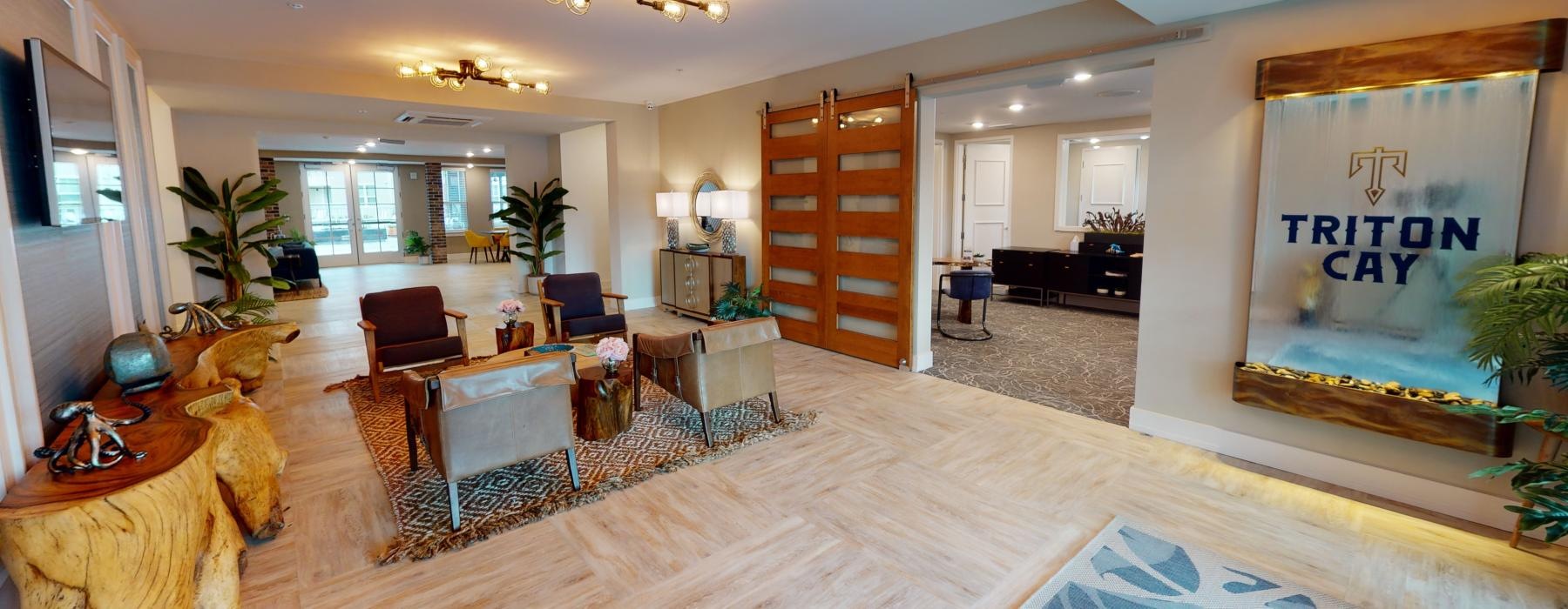 a large living room with a large rug and a large rug