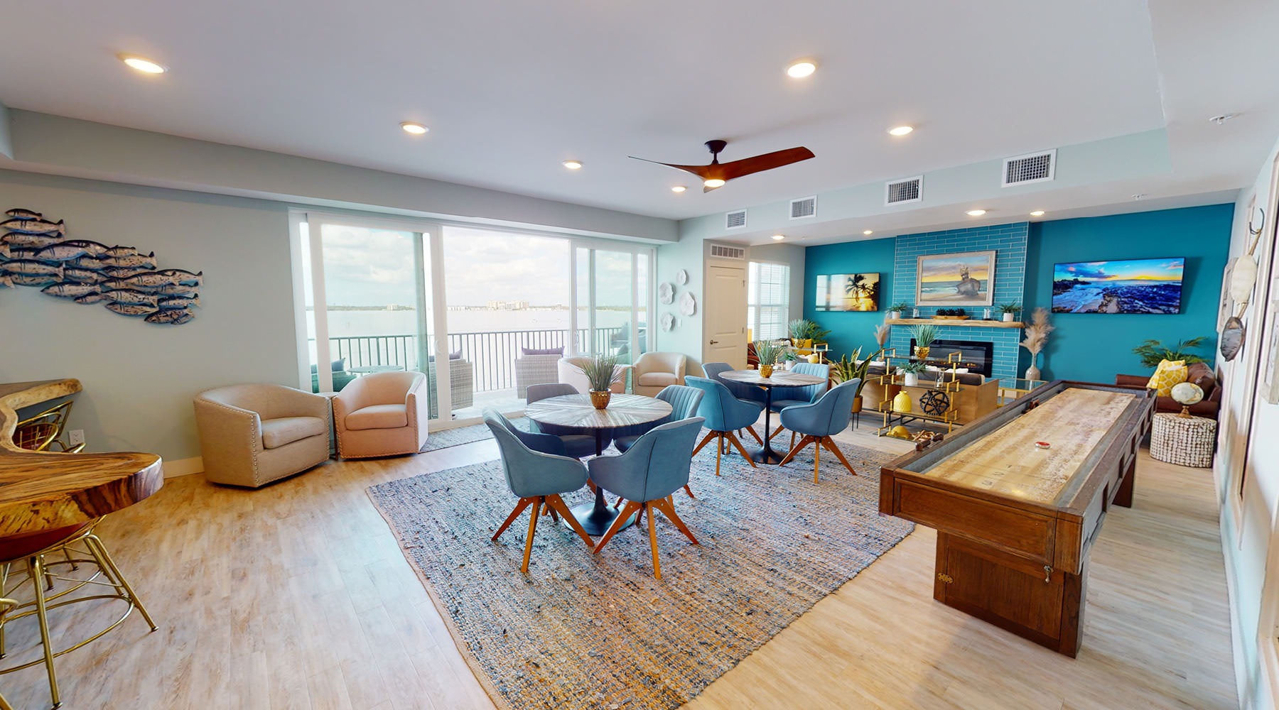 a room with a table chairs and a couch